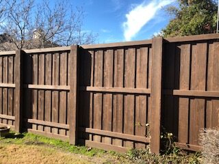 A picture of the box shaped brown color wooden fencing